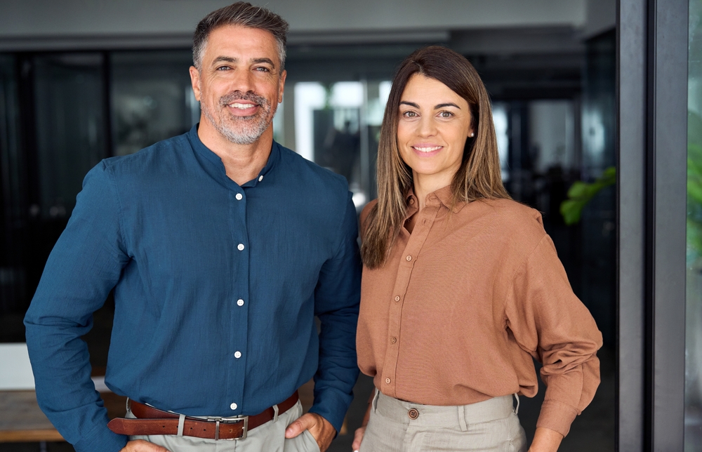 Two,Happy,Confident,Professional,Mature,Middle,Aged,Latin,Business,Man Two financial professionals representing an independent broker-dealer partnership.