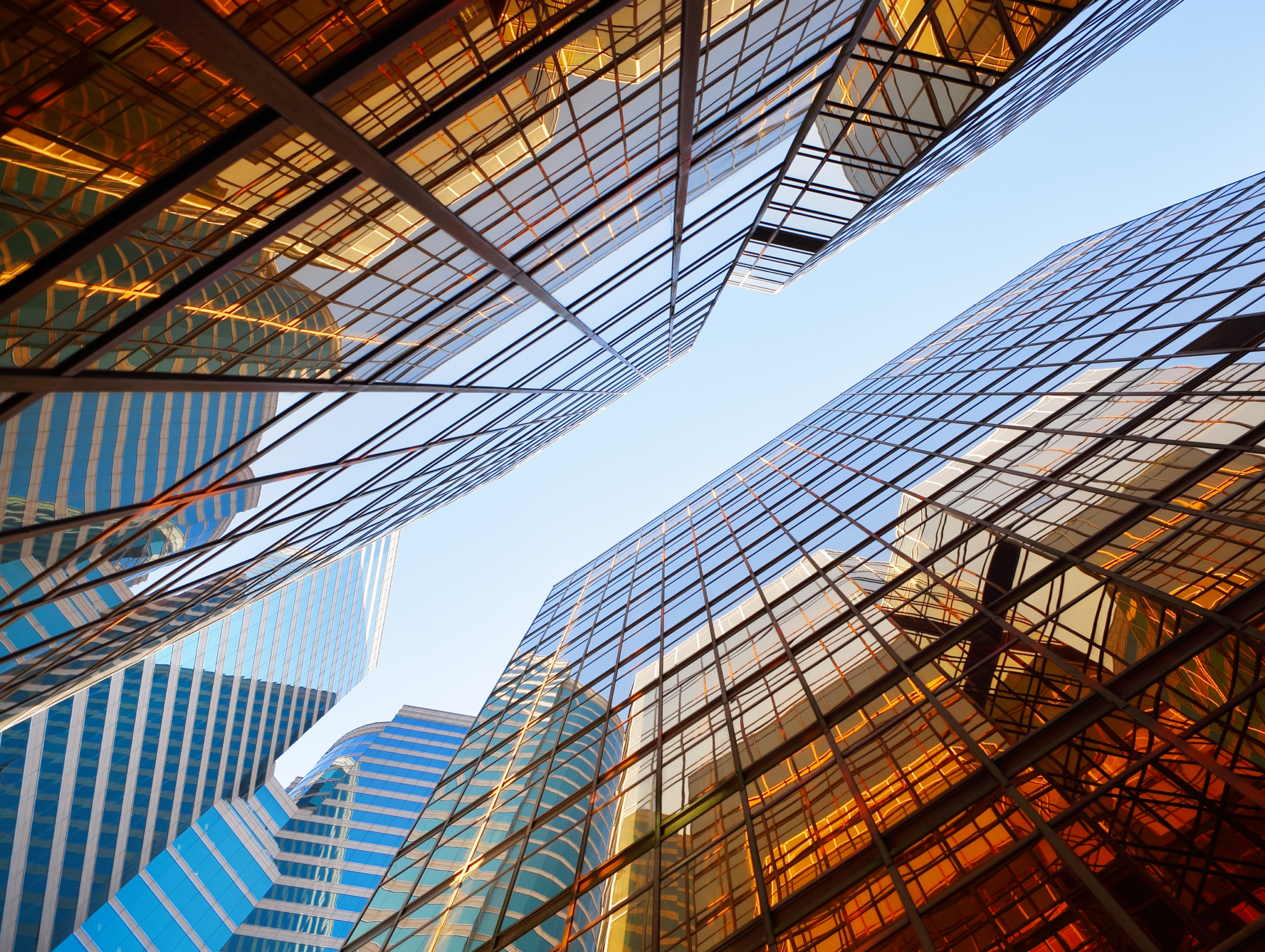 Modern office buildings representing an independent broker-dealer financial firm.